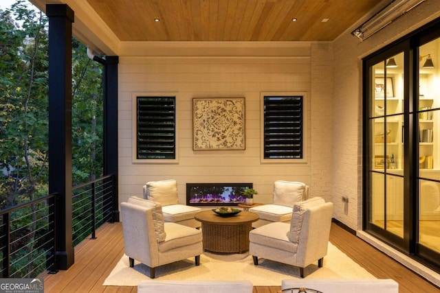 interior space with light wood-type flooring and wood ceiling