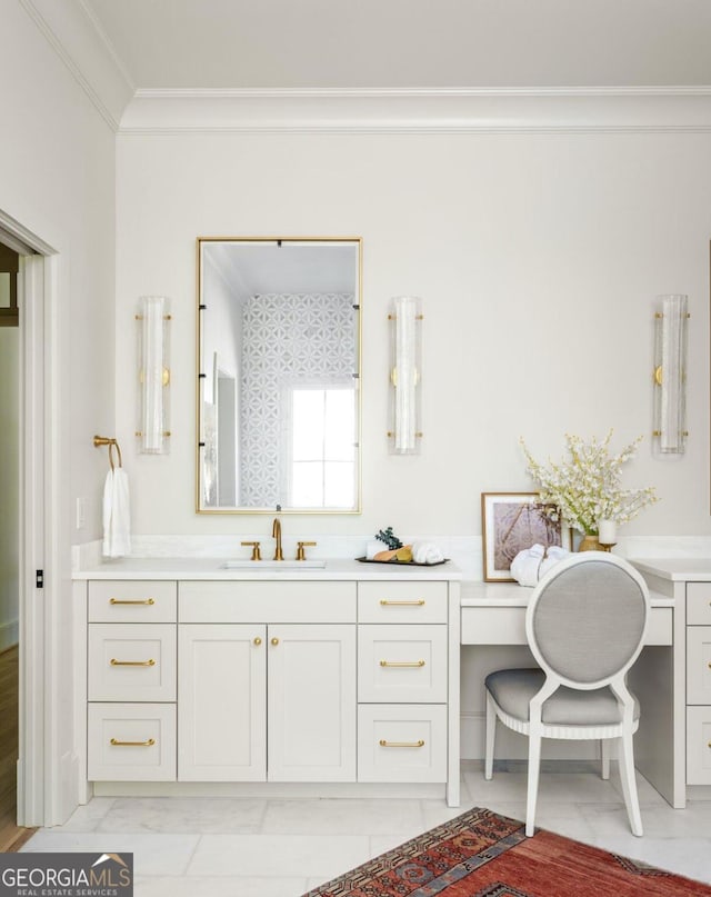 bathroom featuring crown molding and vanity