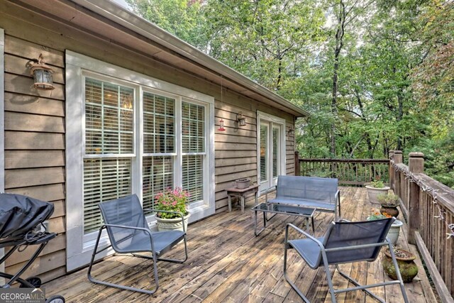 wooden terrace with grilling area