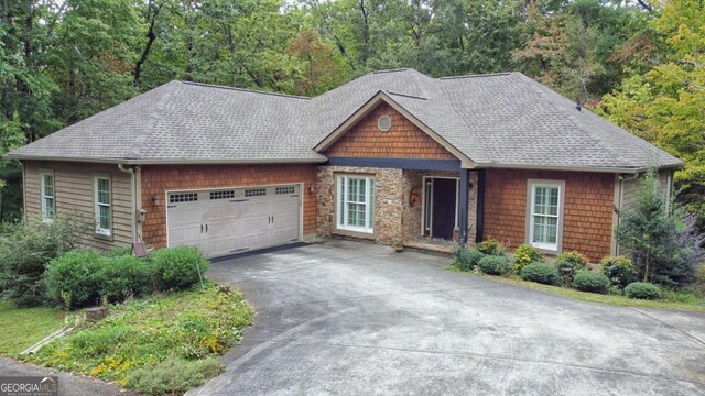 view of front of property featuring a garage