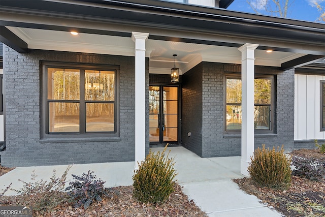 doorway to property featuring a porch