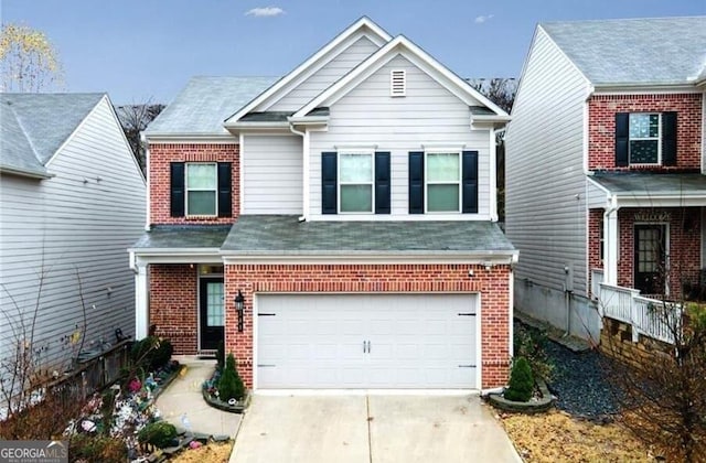 view of front of home with a garage