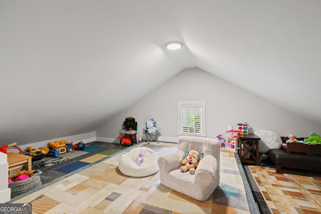 game room featuring lofted ceiling