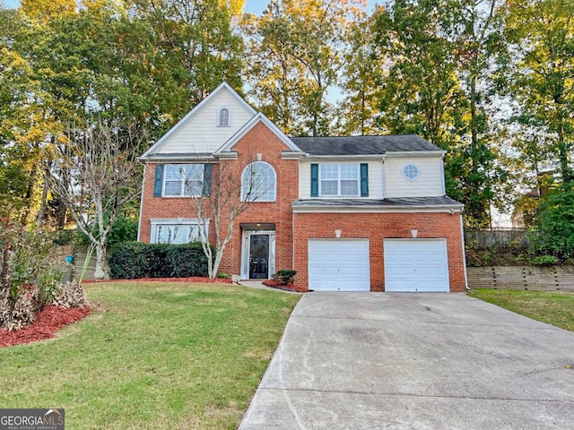 view of front property with a front lawn and a garage