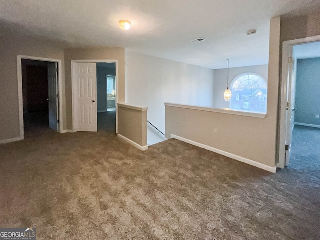 spare room with carpet flooring