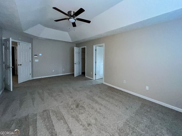 unfurnished bedroom with lofted ceiling, carpet floors, and ceiling fan