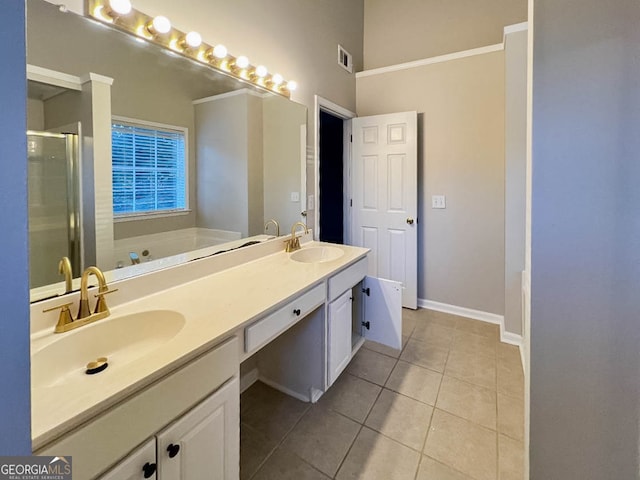 bathroom featuring vanity, shower with separate bathtub, and tile patterned flooring