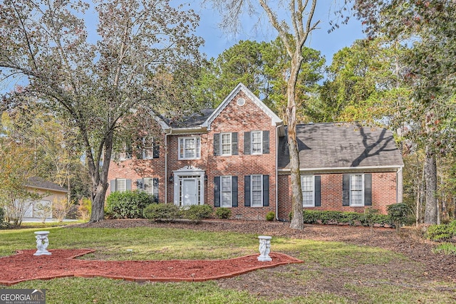 view of front of home with a front yard