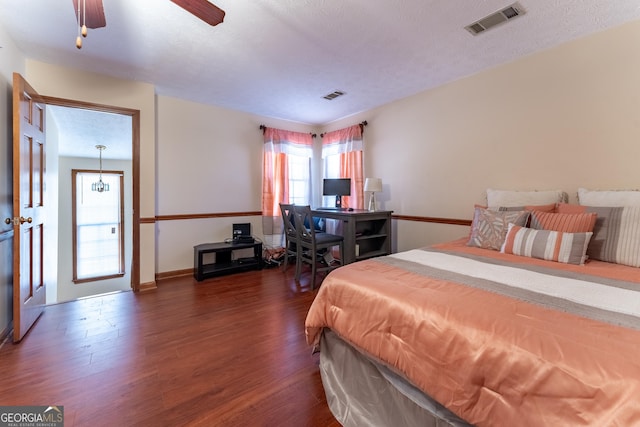 2582 Fairview Ln, Jonesboro, GA 30236 - bedroom featuring visible vents, a textured ceiling, and wood finished floors