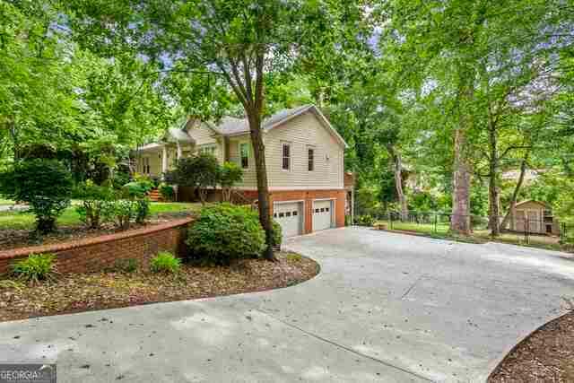 view of property exterior featuring a garage