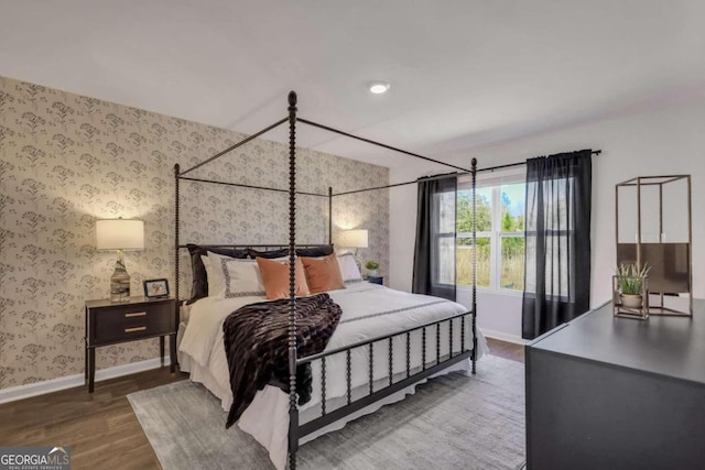 bedroom featuring wood-type flooring