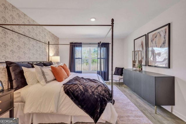 bedroom with light hardwood / wood-style flooring