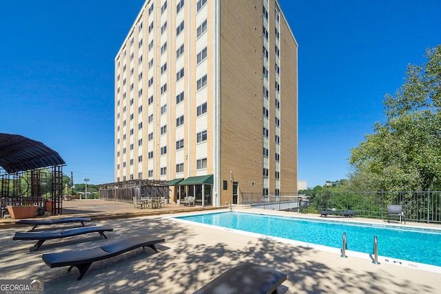 view of pool featuring a patio