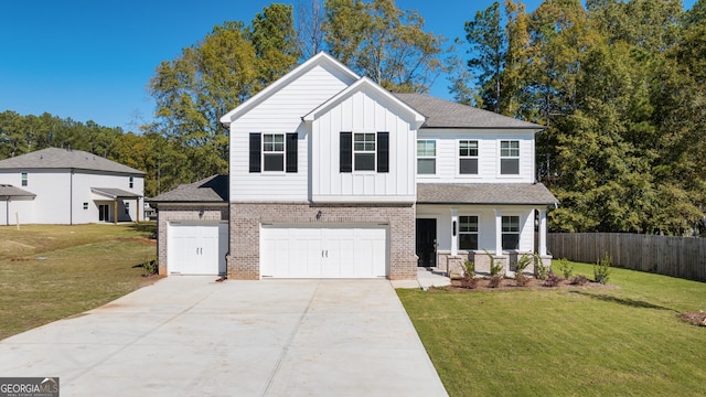 view of front facade featuring a garage and a front lawn