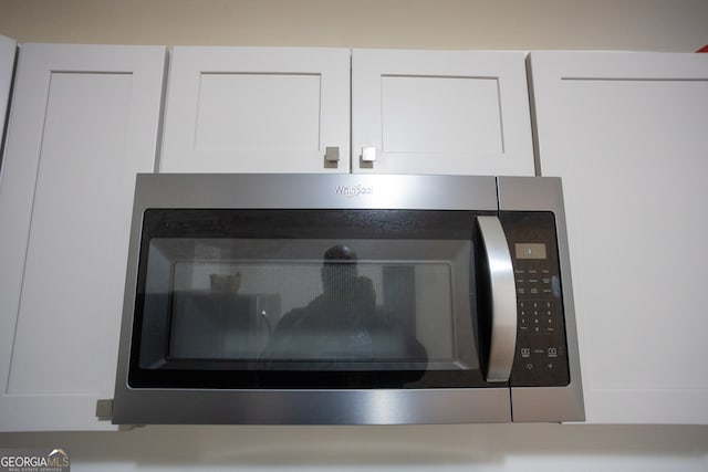 room details featuring white cabinetry