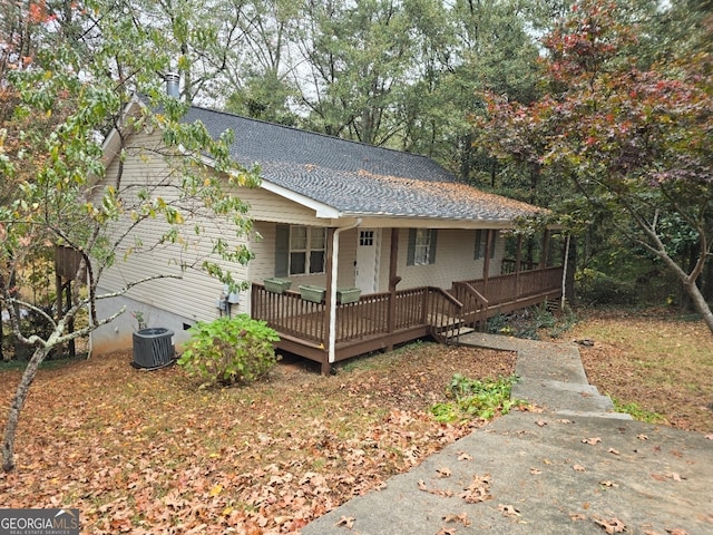 view of front of house featuring a deck and central AC unit