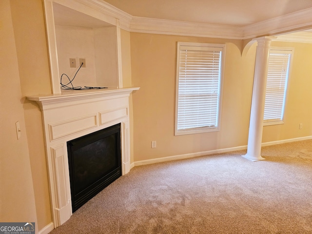 unfurnished living room featuring crown molding and carpet flooring