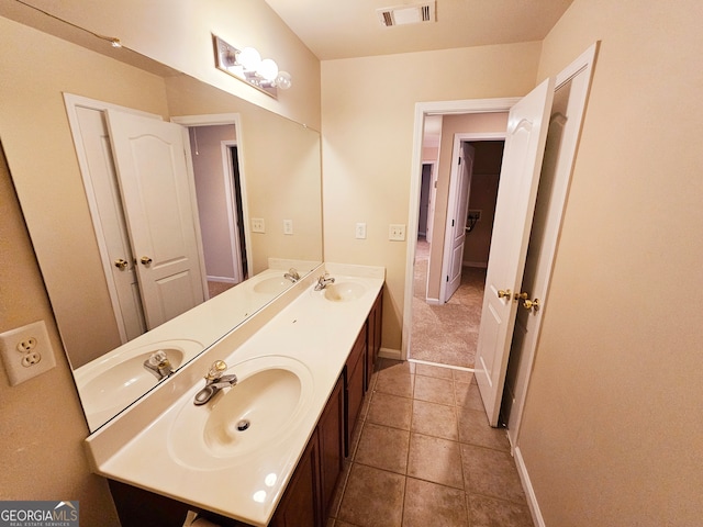 bathroom featuring vanity and tile patterned floors