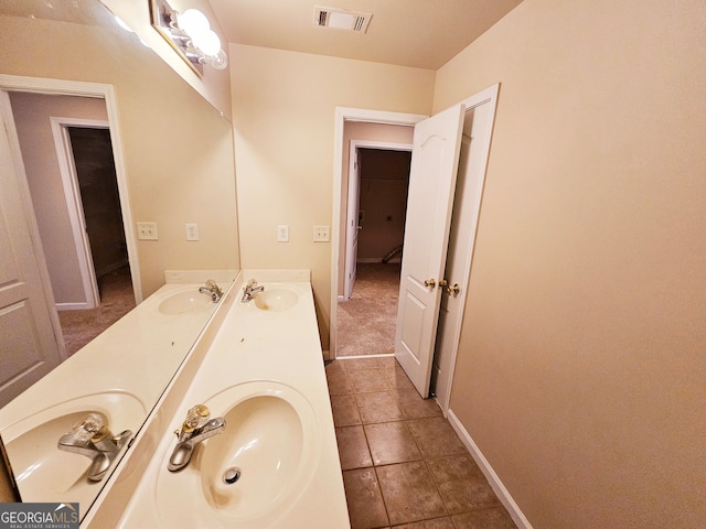 bathroom featuring vanity and tile patterned floors