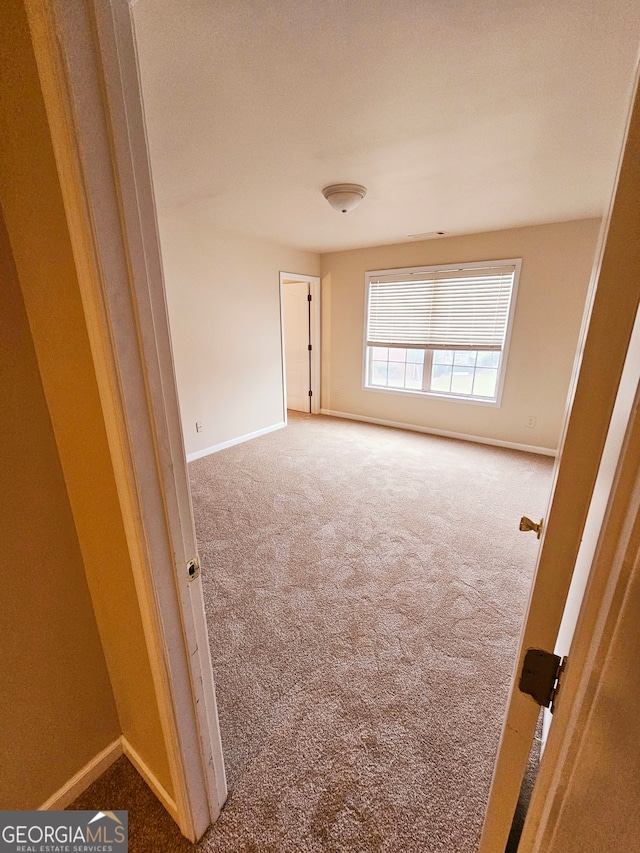 view of carpeted empty room