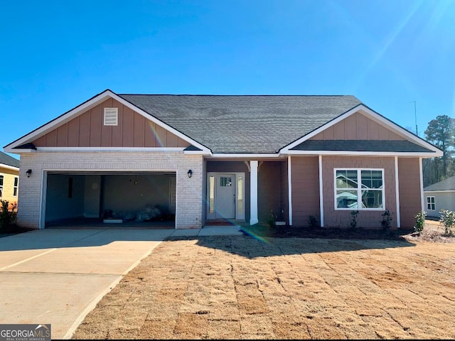 ranch-style house featuring a garage