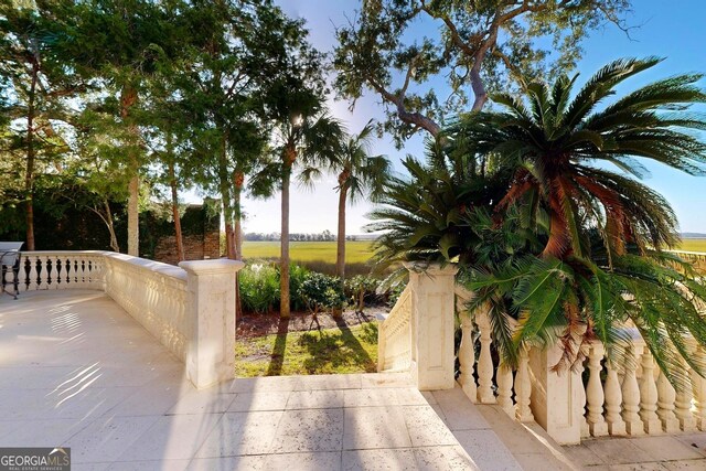 view of patio / terrace featuring ceiling fan