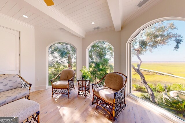 interior space featuring beamed ceiling