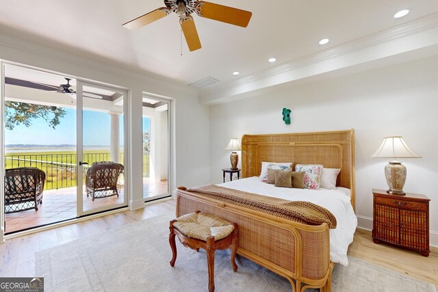 bedroom with crown molding and light wood-type flooring