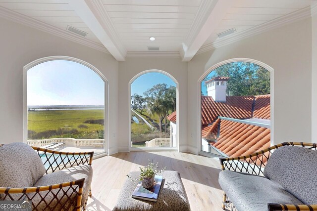 rec room with light hardwood / wood-style floors, ornamental molding, pool table, and ceiling fan