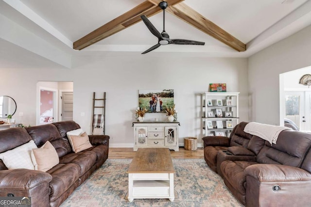 living room with beam ceiling, light hardwood / wood-style floors, and ceiling fan