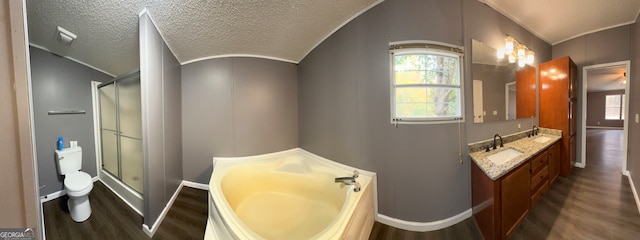 full bathroom with toilet, independent shower and bath, vanity, and wood-type flooring