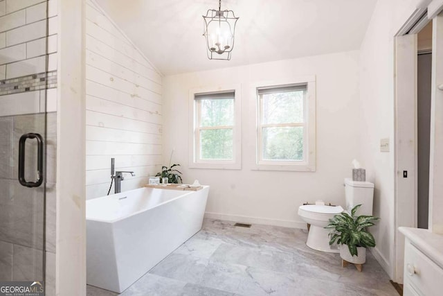 full bathroom featuring lofted ceiling, plus walk in shower, toilet, an inviting chandelier, and vanity