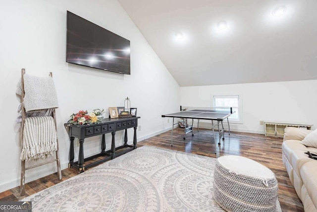 game room featuring vaulted ceiling and hardwood / wood-style floors