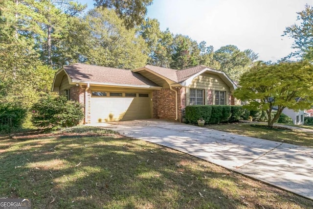 single story home with a front lawn and a garage