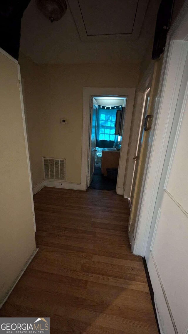 hallway featuring hardwood / wood-style floors