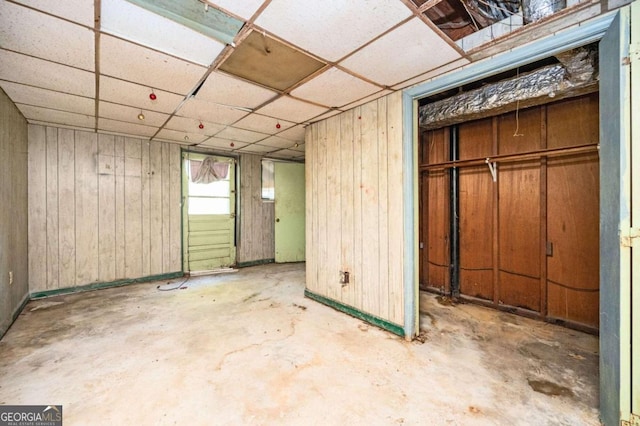 basement with wooden walls