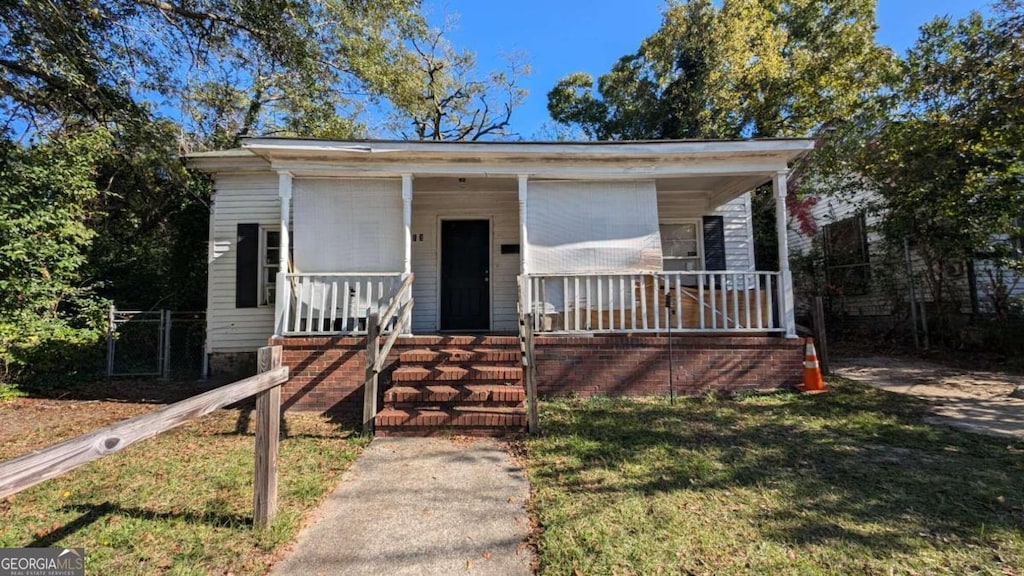 313 Forest Ave, Macon, GA 31201 - view of front facade featuring covered porch