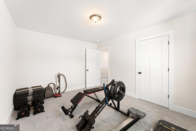 workout area with light colored carpet