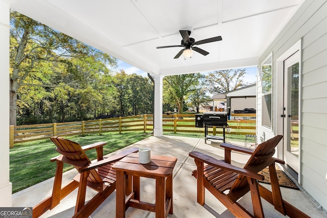 view of patio with french doors and ceiling fan