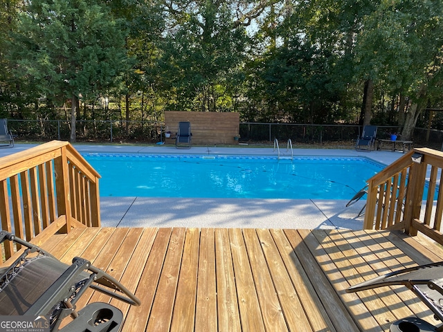 view of pool with a deck