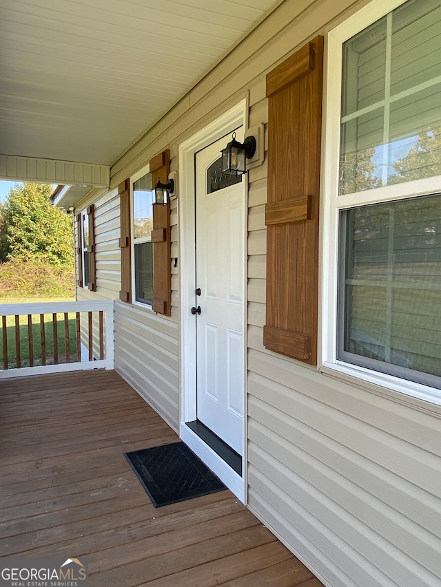 doorway to property with a porch