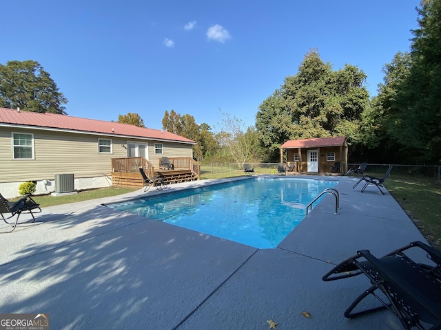 108 Sunset Dr, Dublin, GA 31027 - view of pool featuring fence, a wooden deck, a fenced in pool, and a patio area