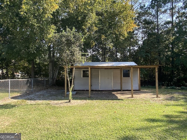 108 Sunset Dr, Dublin, GA 31027 - view of outdoor structure featuring an outdoor structure and fence