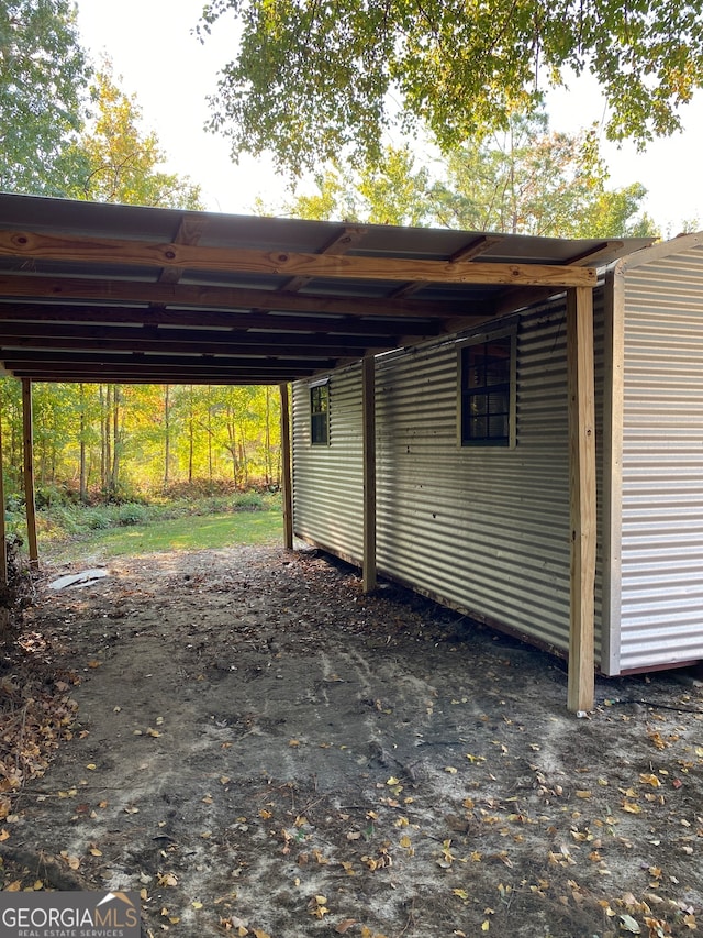 view of parking with a carport