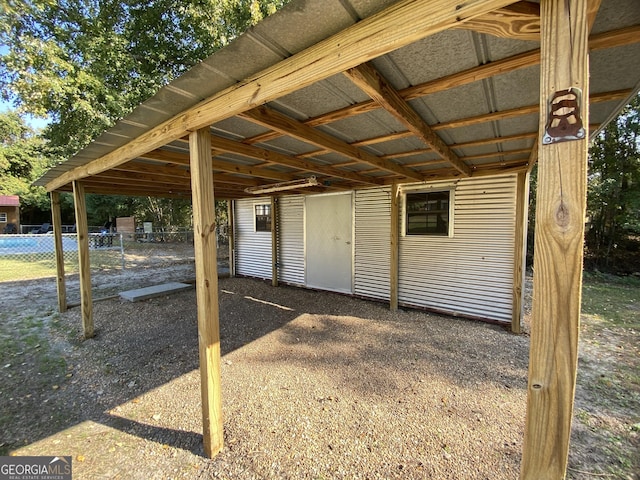 108 Sunset Dr, Dublin, GA 31027 - view of outdoor structure with a carport and fence