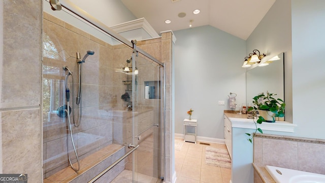 full bath featuring lofted ceiling, a stall shower, vanity, tile patterned flooring, and baseboards