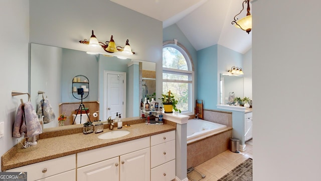 full bath with vaulted ceiling, vanity, a shower stall, tile patterned flooring, and a bath