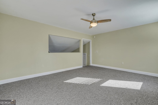 empty room with carpet flooring and ceiling fan