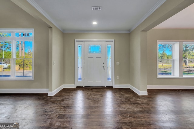 entrance foyer featuring ornamental molding and dark wood-type flooring