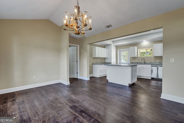 kitchen featuring dishwasher, a center island, pendant lighting, white cabinetry, and dark hardwood / wood-style flooring